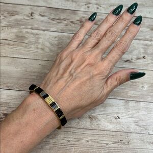 Stella & Dot Gold and Black Beaded Bracelet with feathers